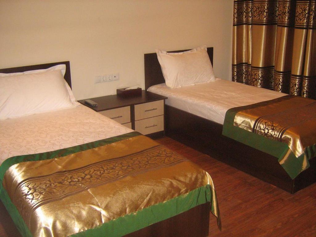 Kausar Hotel Алма Ата Стая снимка