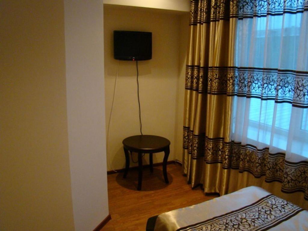 Kausar Hotel Алма Ата Стая снимка